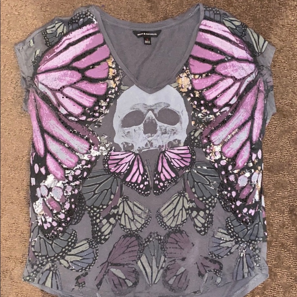 Butterfly and skeleton top